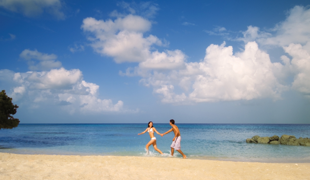 Almond Beach Resort,Barbados- Couple In The Sand
